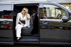 Chauffeured Woman In Van.001 300x199